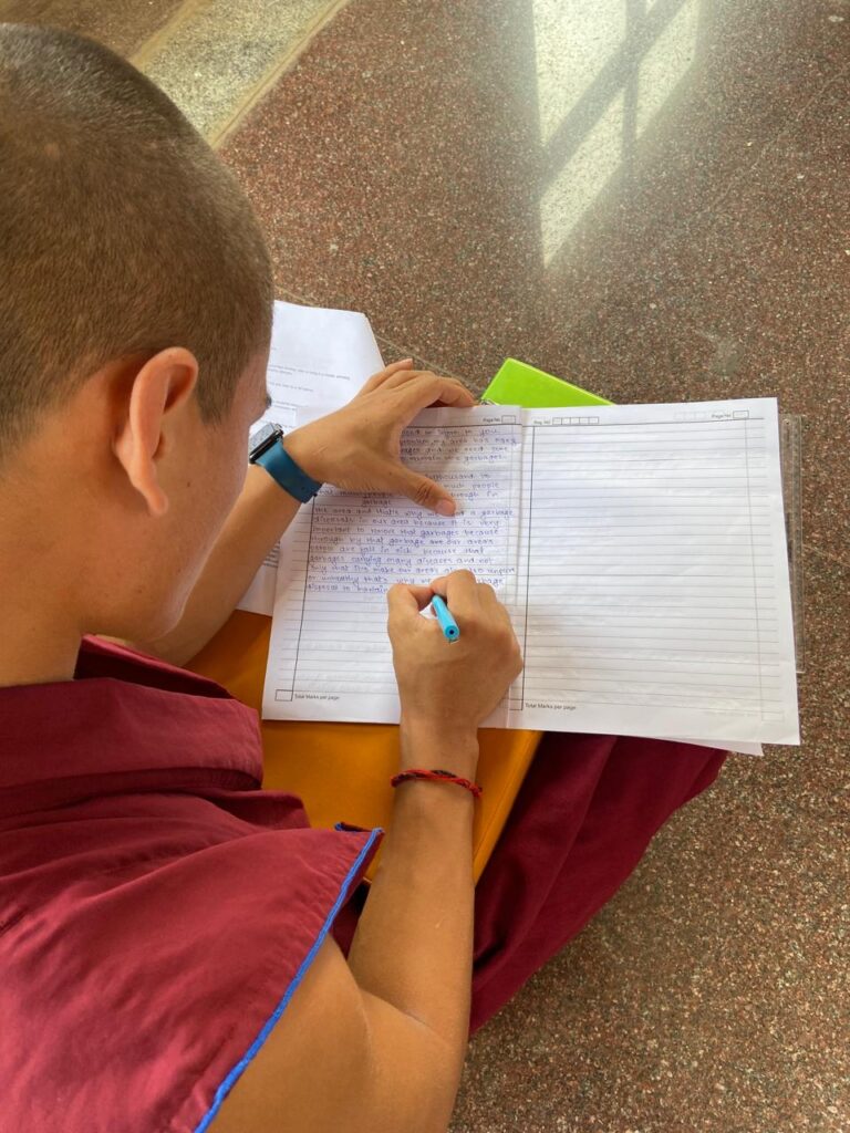 CLASS 8 STUDENTS TAKING EXAM